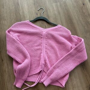 Pink sweater with scrunch in middle